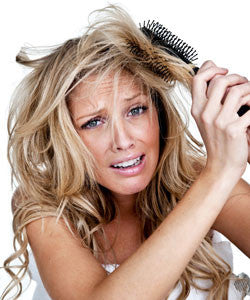 Q. How do you get rid of hair tangles without pulling out more hair?